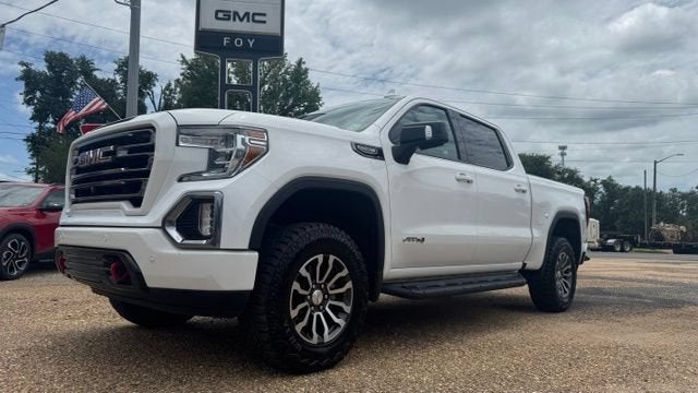 2020 GMC Sierra 1500 AT4 in Summit White — front three-quarter view